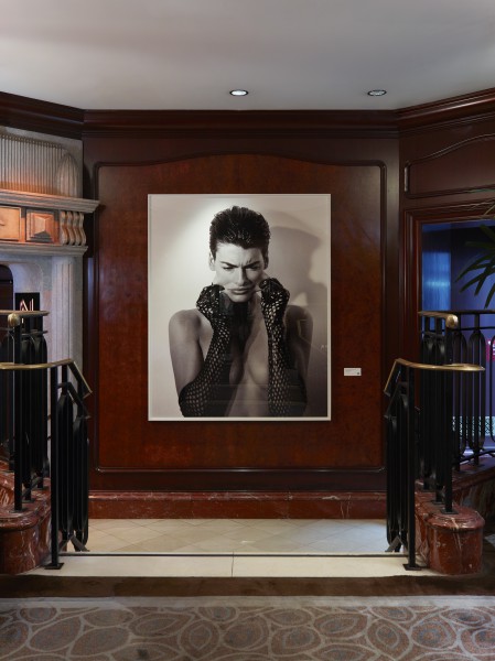 Steven Meisel's Linda Pulling Face, 1989 greeting guests at the entrance of Salon de Ning, NYC.  
