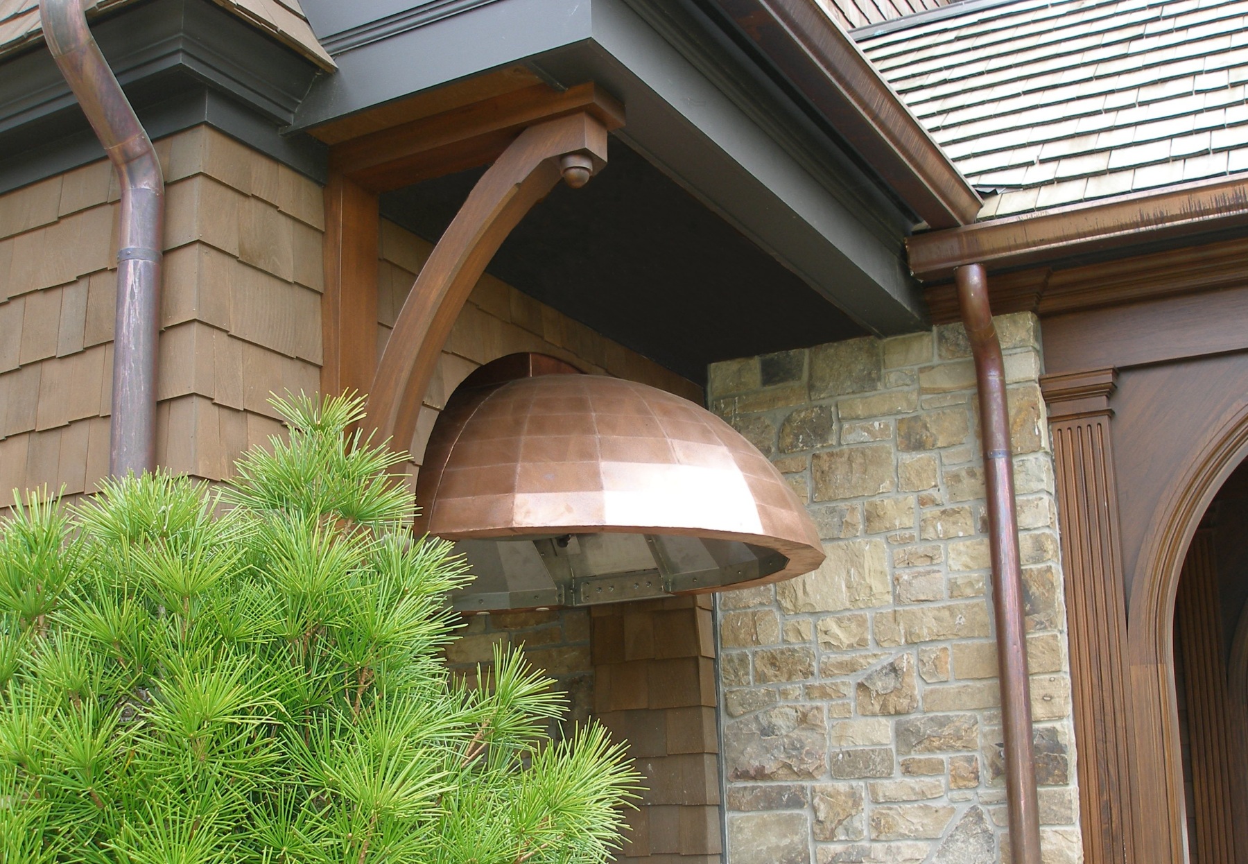 Decorative copper grill hood