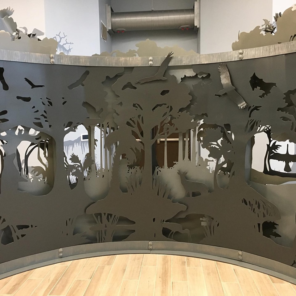 Explore, the sculptural entrance wall at the Doral Glades Nature Museum in South Florida