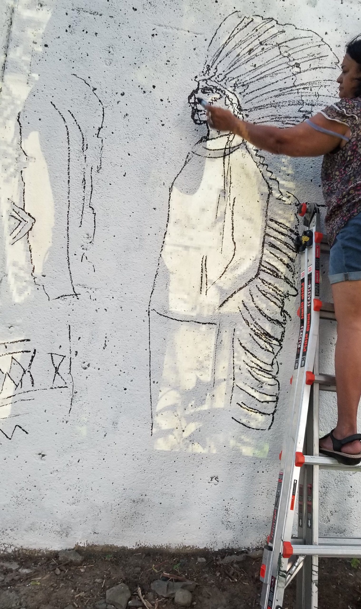 Cypress Street Land Acknowledgement Mural 2019  by Native American Wampanoag Artist  Deborah Spears Moorehead An  Outdoor Painted Mural on a Cement Bridge Wall  14 feet high by 30 feet wide