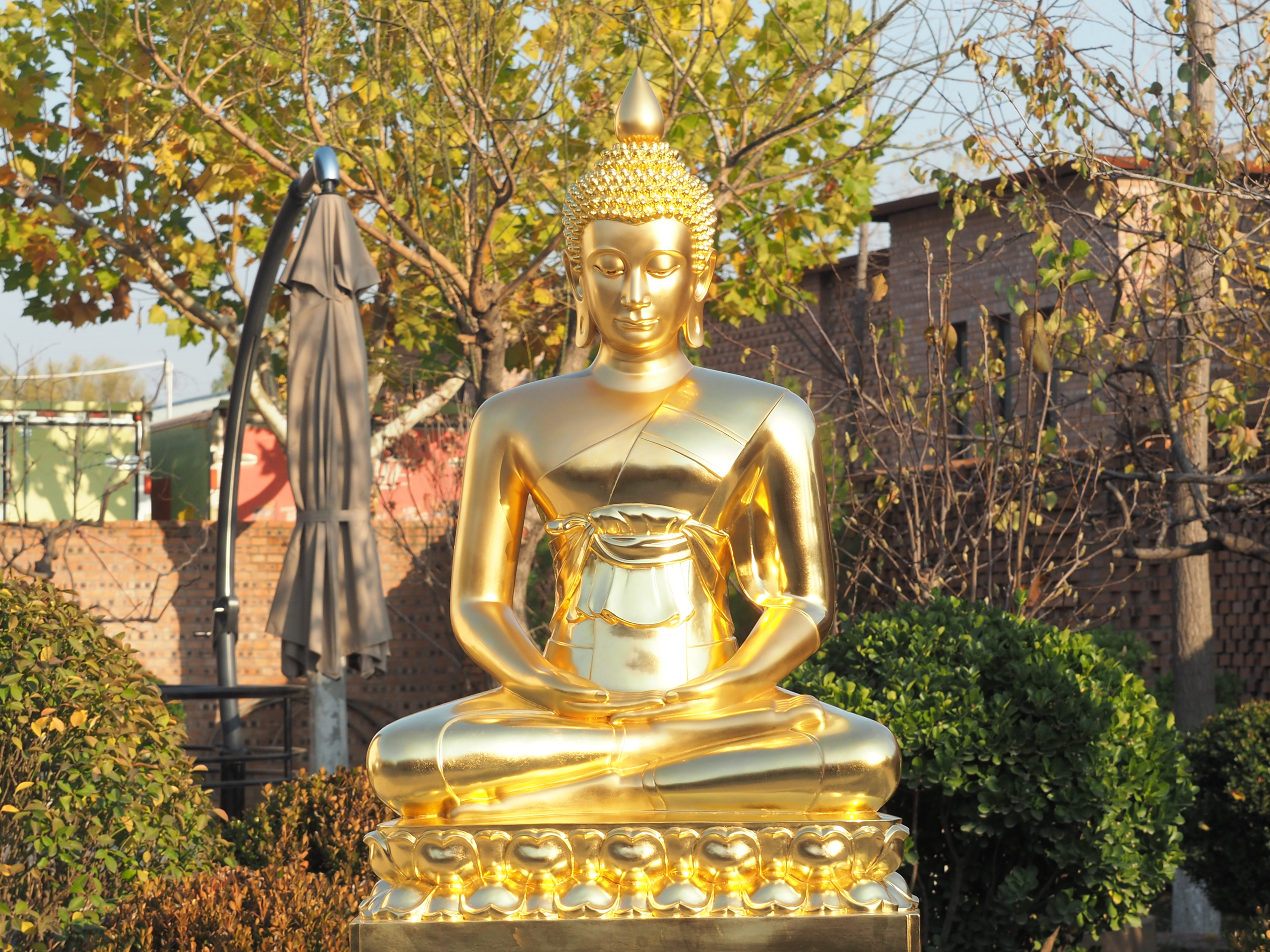 Gold Leaf Bronze Buddha Statue